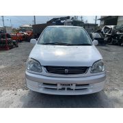Планка под фары (цельная) Toyota Raum EXZ10 5E-FE A244L -01A 2001 V111