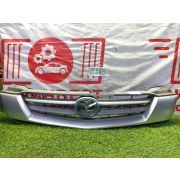 Решетка радиатора Mazda Demio DW3W B3-E FNC219090E 2001 Z383