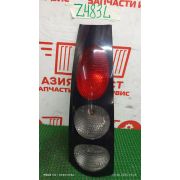 Фонарь стоп-сигнала левый Toyota Raum EXZ10 5E-FE A244L -01A 2002 Z483