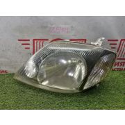 Фара левая Toyota Allex NZE121 1NZ-FE U340E -05A 2001 Z544